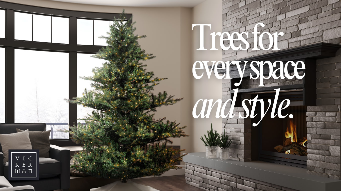 Realistic artificial Christmas tree with warm white LED lights in decorated living room